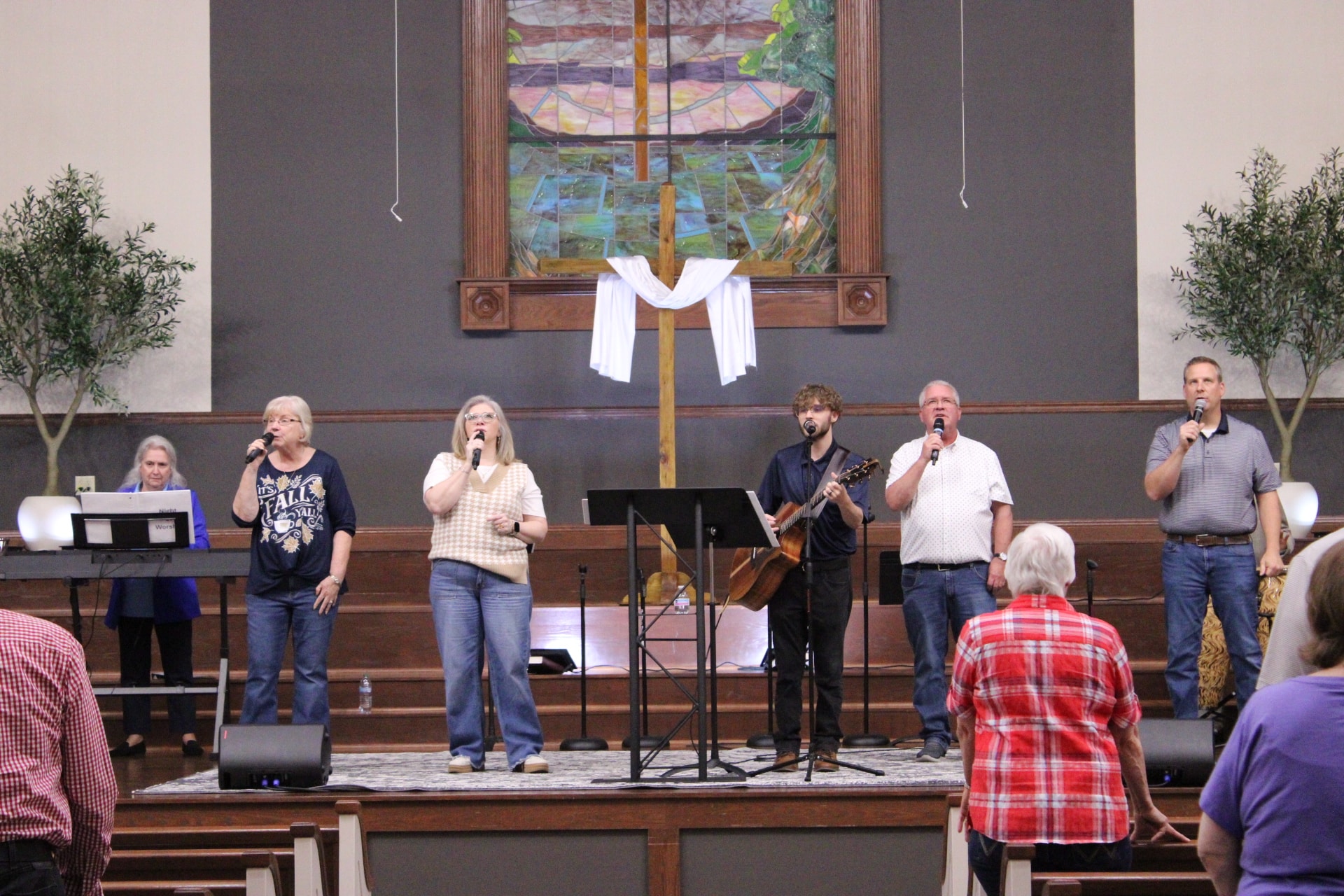 Church worship band performing with congregation