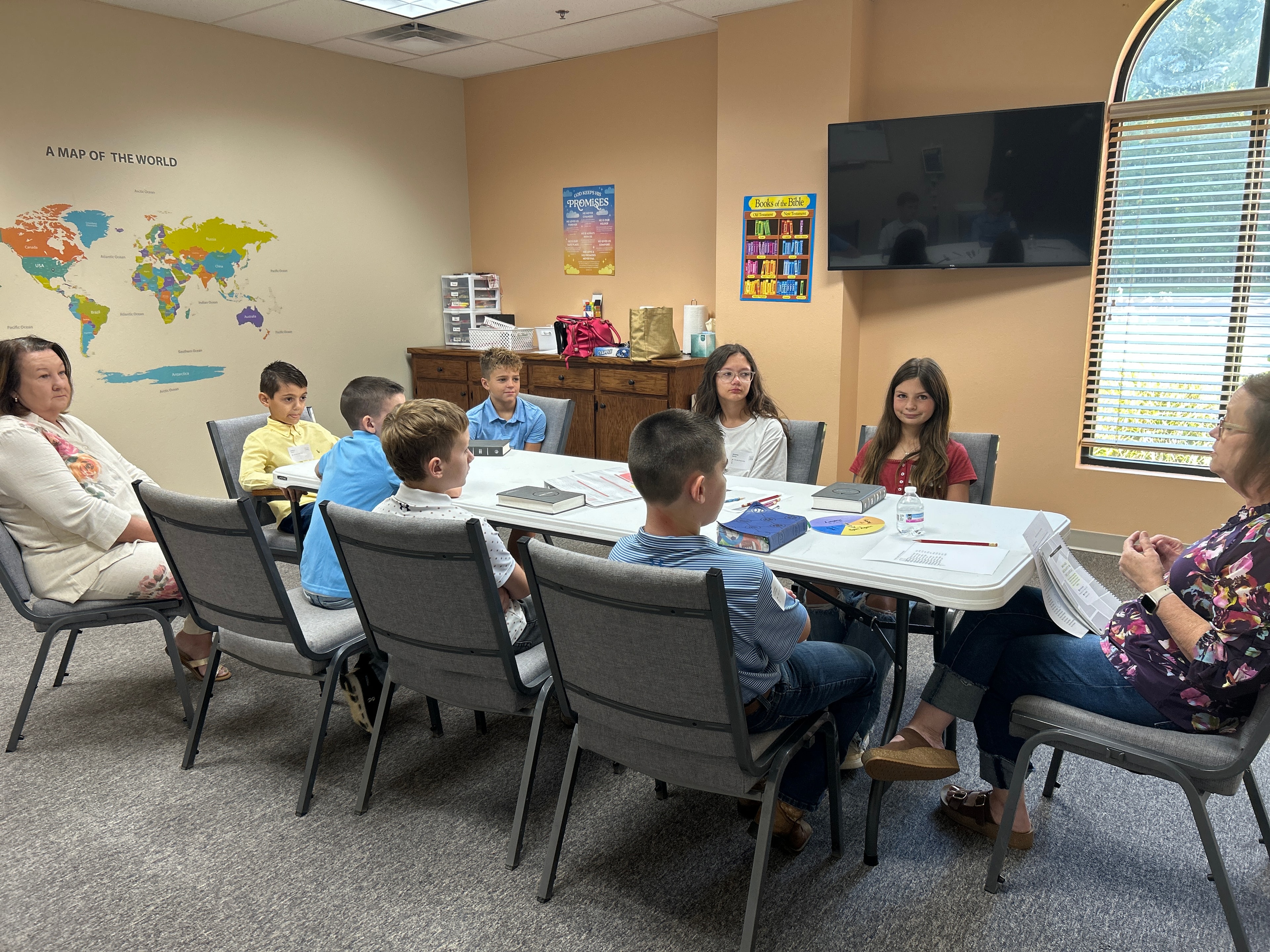 Kids and adults in circle